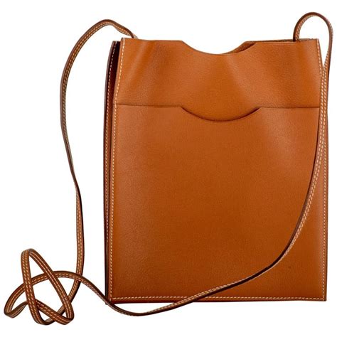 hermes caramel shoulder bag with button|hermes leather handbags.